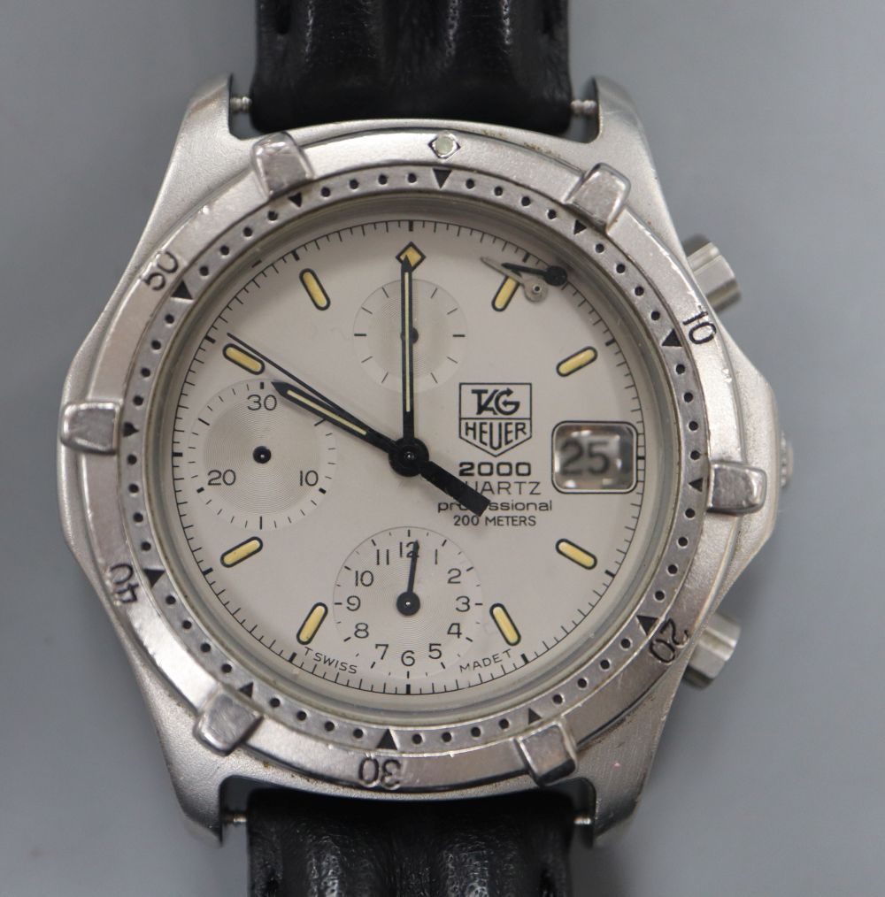 A gentlemans modern stainless steel Tag Heuer 2000 Quartz Professional wrist watch, on associated strap,